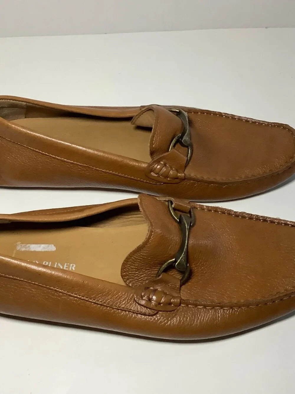 Authentic Donald Pliner genuine leather loafers in a beautiful cognac brown